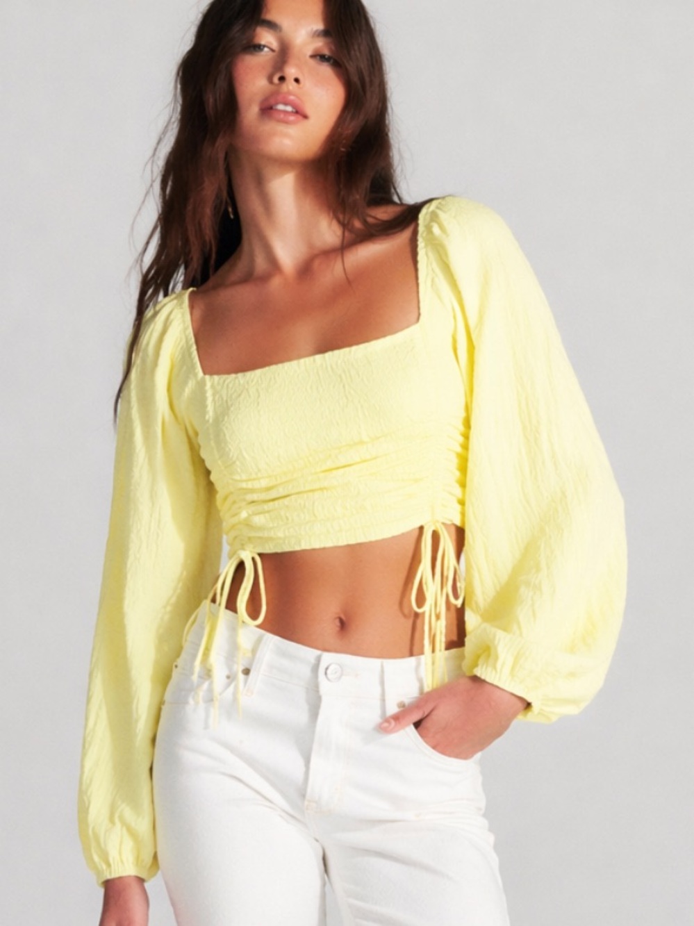 Sophie Rue Ruched Long Sleeve Crop Top in Yellow